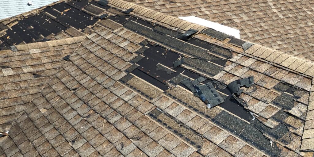 Merit Roofing & Construction - storm damage repair services